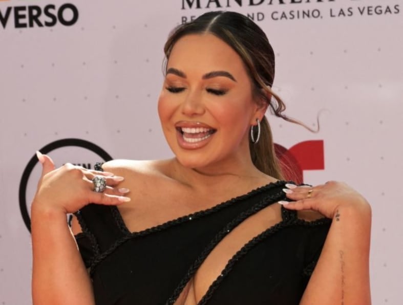 Chiquis Rivera shows off her new beach body in an orange bikini! (PHOTOS)