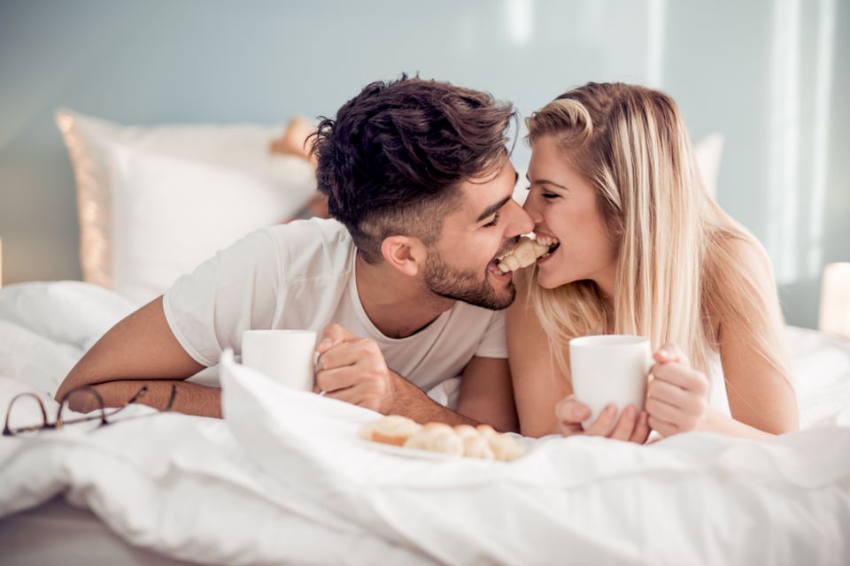 Man & woman in bed