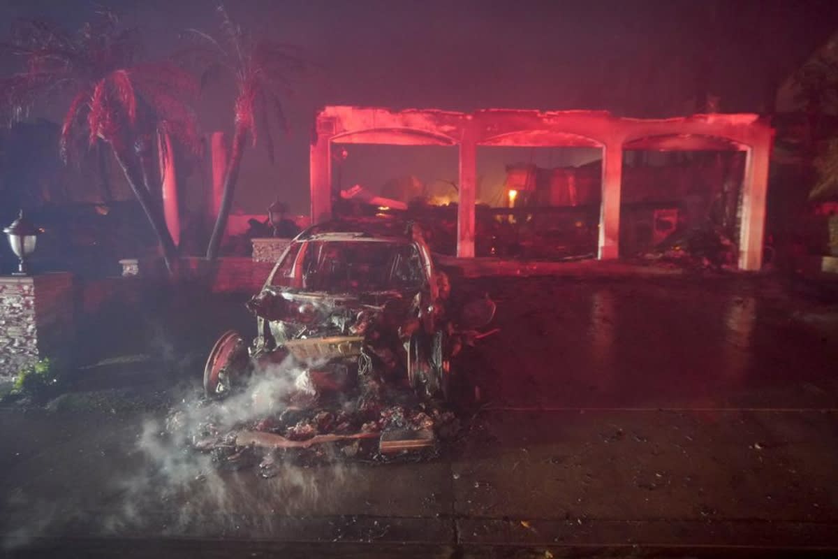 Wildfire burns dozens of houses and authorities say what’s coming next