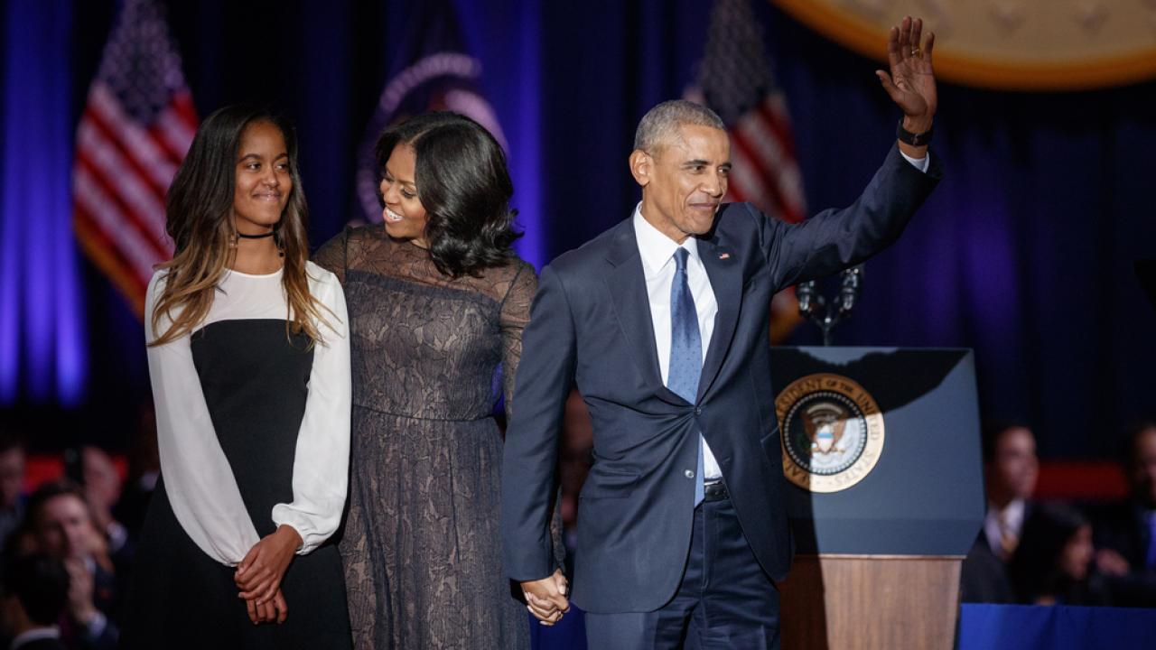 Paparazzi catch the Obamas and their daughters at the beach