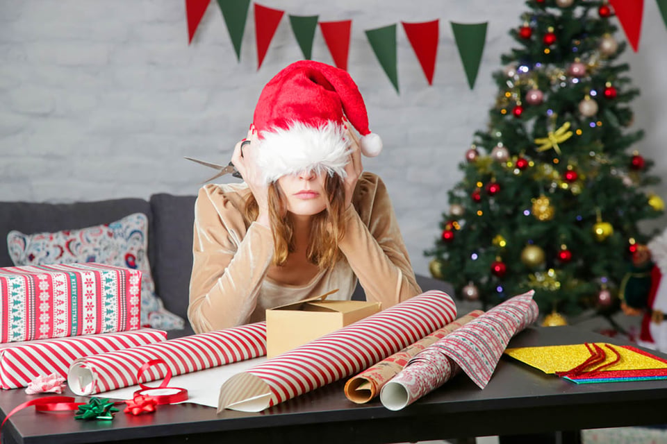frustrated woman, wrapping, Christmas, holiday health