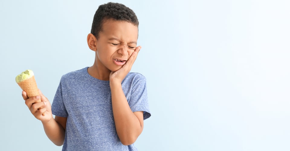 A child with tooth pain