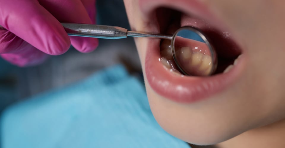 Child at dentist in dental consultation