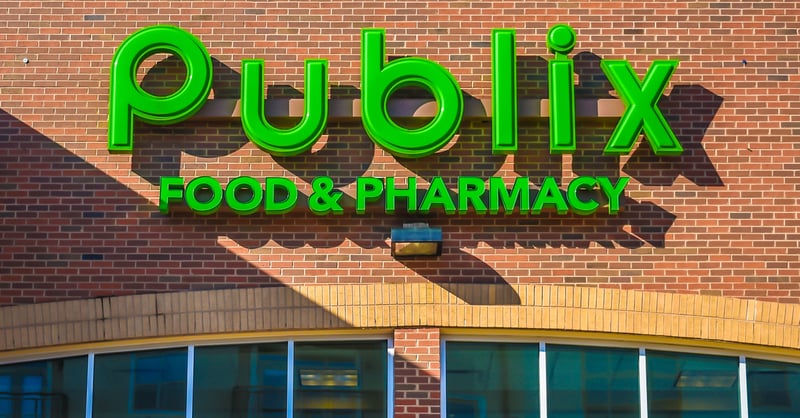 Publix sign, which accepts coupons