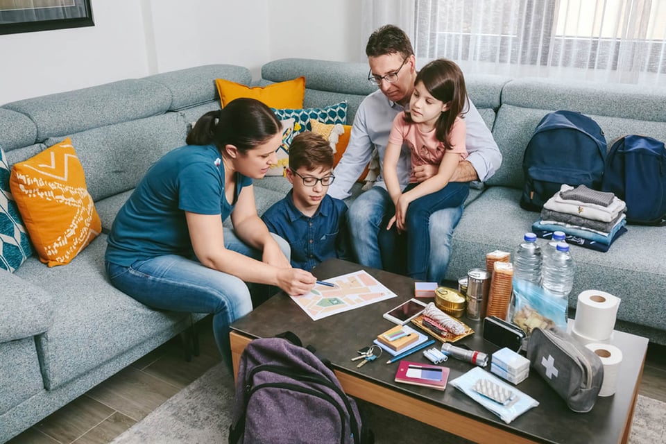 Mother and her family, preparing emergency kit